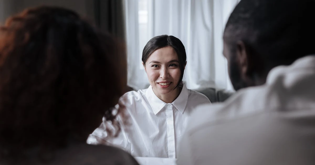 A couple negotiating informal debt settlement with a creditor.